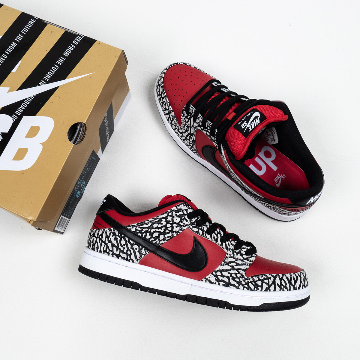 Supreme x Nike SB Dunk Low "Red Cement" Shoes
